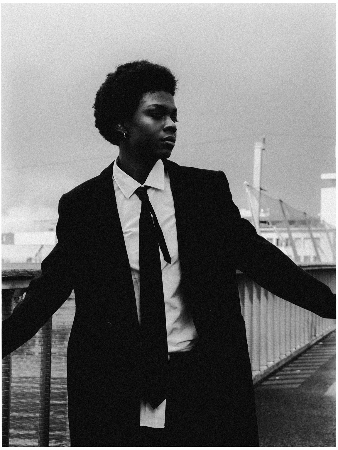 Black and white fashion portrait on a rooftop