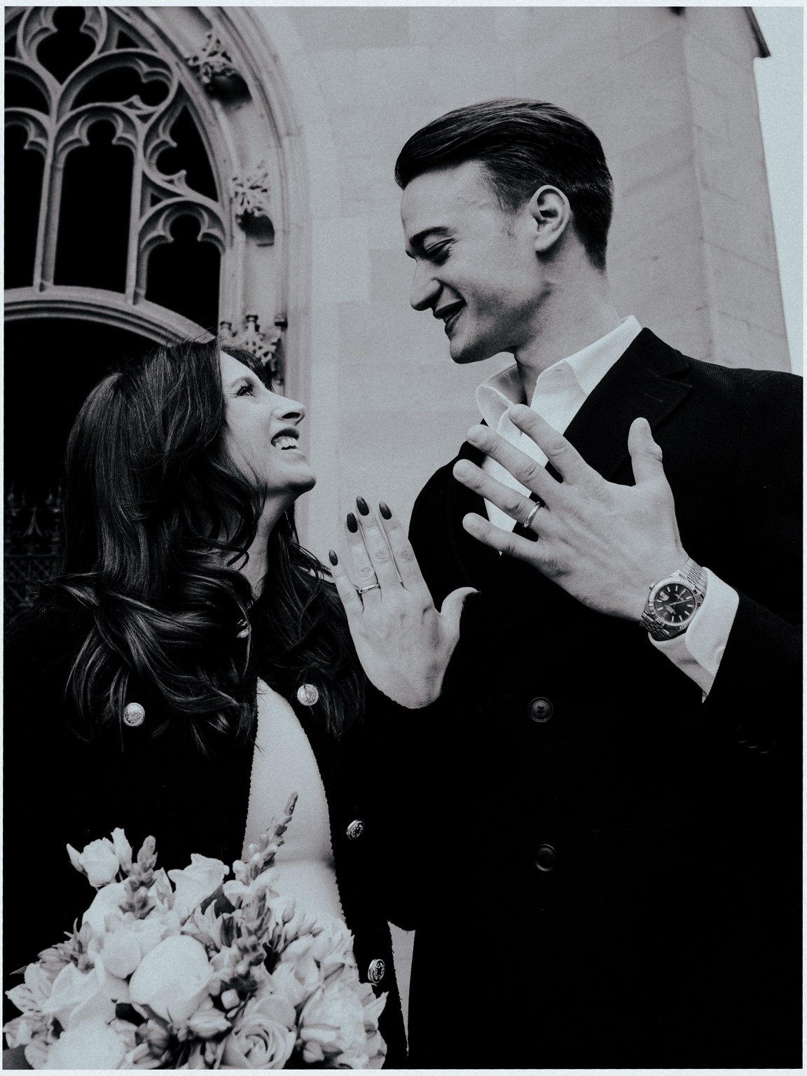 Newlyweds showing their rings